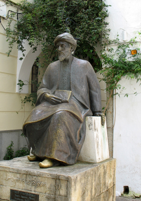 CORDOBA: After leaving the Mezquita, we walked around the old Jewish quarter, the Juderia. Córdoba likes to boast that the great Jewish scholar Moses Maimonides (also known as “Rambam”) was born here (in 1135), though he did most of his thinking elsewhere since his family was forced into exile by the Almohades when he was only thirteen. This modern sculpture memorializes the famous thinker on a little street named after him just outside the best-preserved synagogue in Spain.