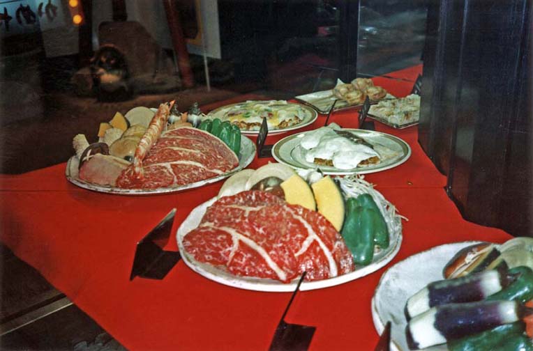 NARA: May 22: Since we had to wait for our train to Kobe, we spent some time exploring the food displays in a department store connected to the Kyoto train station. Here are expensive melons, lavishly presented.