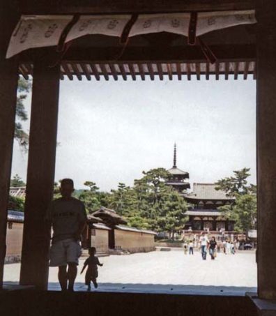 NARA: May 23: We took a very long bus ride from the city center to the grounds of the Horyuji Temple, a large complex of shrines and other buildings. There is some dispute about how much remains of the original 7th century construction, but much of it is very old. Some of them are among the world’s oldest surviving wooden structures. This is the view from the gateway toward the Kondo (main hall—6th-8th C.).