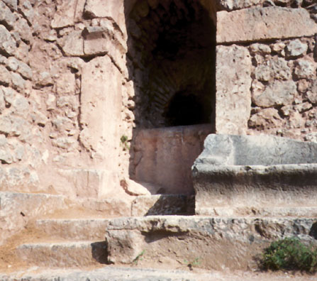 DELPHI: This rounded arch probably marks a Roman construction, since though the Greeks knew of such arches, they seldom used them.