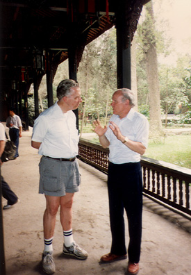THREE SUS: Tom and Doug talking in the shrine.