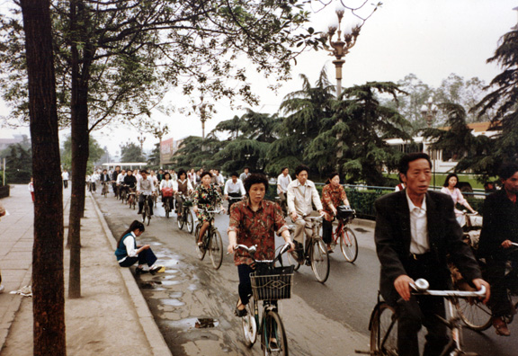 CHENG DU: At that time bicycle traffic was very heavy, with many elegantly dressed women pedaling along the streets as well as the men.