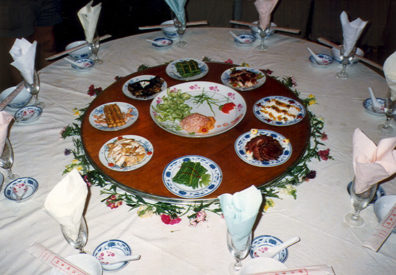 SZECHUAN MUSIC CONSERVATORY: I had talked the group into trying Chinese music (with Tom loudly protesting "No Peking opera!"), expecting we would get tickets for some performance; but Mr. Cai arranged a stunning private concert for us at the Szechuan Music Conservatory. They treated us to a fantastic dinner cooked by their flutist-chef. . . .