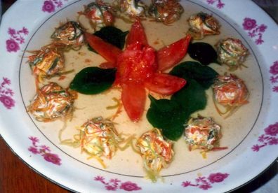 SZECHUAN MUSIC CONSERVATORY: The food was overwhelming, and we applauded the chef, but he complained, "You didn't eat very much!" I found that if I sampled just one chopstick-pinch of food from each dish at a feast like this, I would still wind up stuffed. Of course, the problem was exacerbated by the fact that we were usually offered dinner around 5:00 or so, after having earlier eaten a heavy lunch.