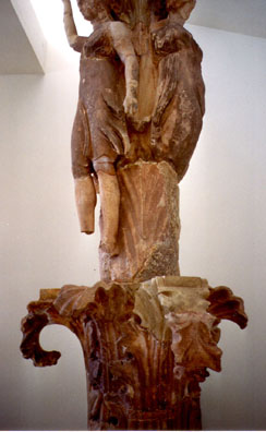 DELPHI: Three dancers atop an acanthus pillar