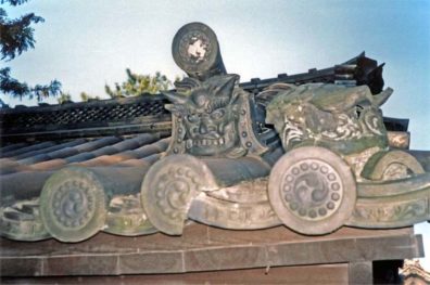 NARA: Nara is very proud of its architectural history. This recent house had traditional fierce-looking guardian spirit images on its roof. May 21, 1998