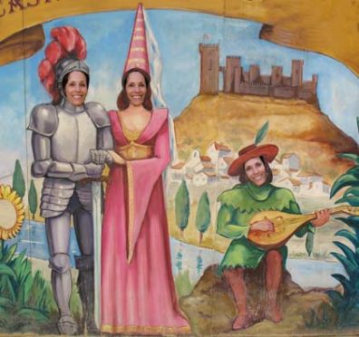 ALMODOVAR DEL RIO: However, as a theme park, it’s a lot of fun. Paula posed as various medieval personages.