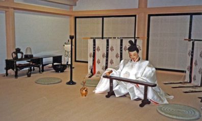 NARA: May 24: Back in Kyoto it was a rainy day, so we decided to explore museums and temples. Our first stop was the costume museum on the top floor of an elegant fabric dealer. They had recreated the costumes Genji gave his various wives and lovers in one chapter of Lady Murasaki’s Genji Monogatari (Tale of Genji). The figures, looking rather interchangeable, were placed in a scale model of Genji’s palace as it’s described in the novel. This scene depicts Genji at work, surrounded by typical furnishings of the period. May 24, 1998