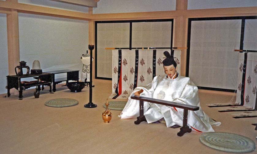 NARA: May 24: Back in Kyoto it was a rainy day, so we decided to explore museums and temples. Our first stop was the costume museum on the top floor of an elegant fabric dealer. They had recreated the costumes Genji gave his various wives and lovers in one chapter of Lady Murasaki’s Genji Monogatari (Tale of Genji). The figures, looking rather interchangeable, were placed in a scale model of Genji’s palace as it’s described in the novel. This scene depicts Genji at work, surrounded by typical furnishings of the period. May 24, 1998