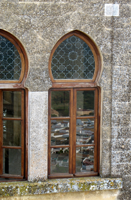 ALMODVAR DEL RIO: The town below is mirrored in a tower window.
