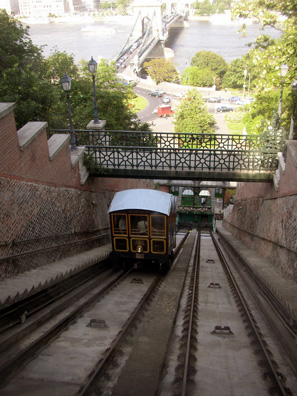BUDAPEST: This tram hauls visitors up the steep incline from the banks of the Danube to the top of Castile Hill in Buda. In the background, the Chain Bridge