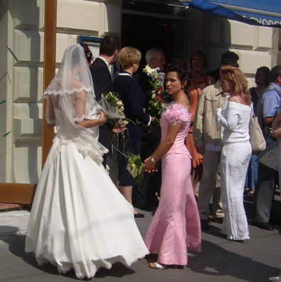 BUDAPEST: One evening when we were out walking we saw a flower-decorated car obviously headed for a wedding, and not long after encountered the wedding party on the sidewalk. Their photographer urged us to snap a shot, but unfortunately the bridal pair's backs were turned.