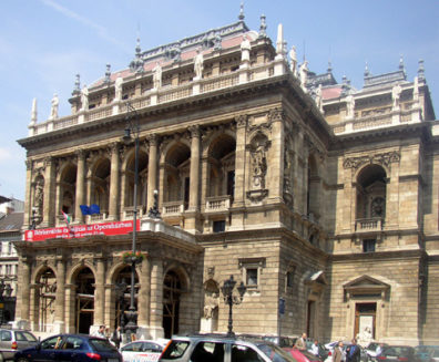 BUDAPEST: On our last night we attended the opera, paying less for third-balcony seats to Verdi's Otello than we were to pay a few days later in New York to go to a movie. Statues of famous composers stand along the top of the opera house.