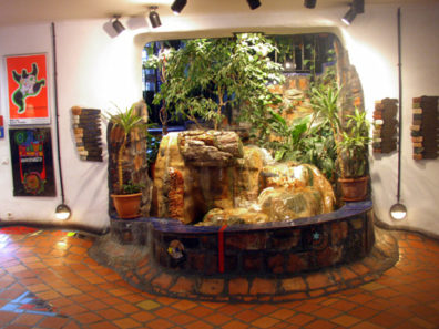 VIENNA: Inside the visitor is greeted with a fountain which--thanks to a series of strategically placed jets--cascades up. The museum is filled with striking paintings, weavings, sculpture, and other works by the prolific Hundertwasser, who lived for most of his life in New Zealand, but who is much beloved in his native Austria.