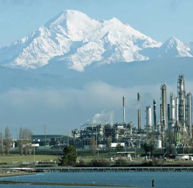 Tesoro plant in Anacortes with snow covered mountain in background