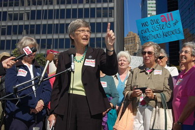 Sister Simone Campbell speaks in front of a crowd