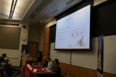 Panelists at table.
