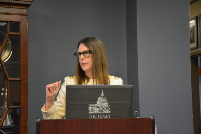 Liz Howard speaking. 