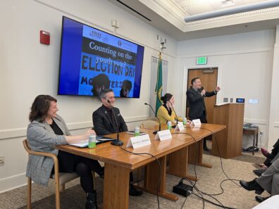 Steve Hobbs facilitating a discussion between Erin Heys, Steve Vuleta, and Kendall Hodson.