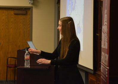 Olyvia Christley speaking. 