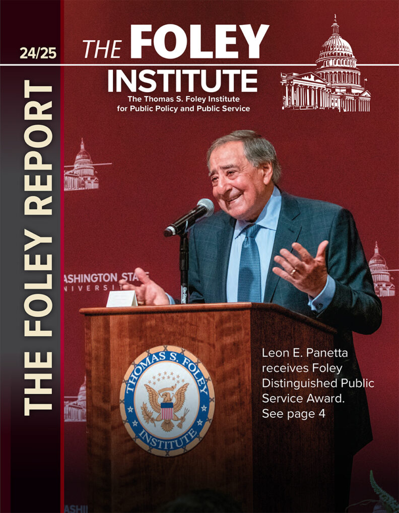 Cover of The Foley Report, 2024/25. The Foley Institute. The Thomsas S. Foley Institute for Public Police and Public Service. Image shows Leon E. Panetta speaking at podium. Caption: Leon E. Panetta receives the Foley Distinguished Public Service Award. See page 4.