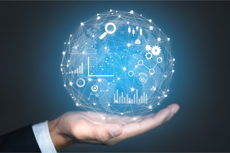 Businessman's hand holding a digital sphere with icons on it.