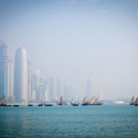 Boats on waterfront in Qatar, photo by Omar Chatriwala