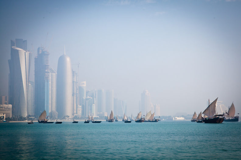 Boats on waterfront in Qatar, photo by Omar Chatriwala