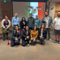 group of faculty and students posing for a picture