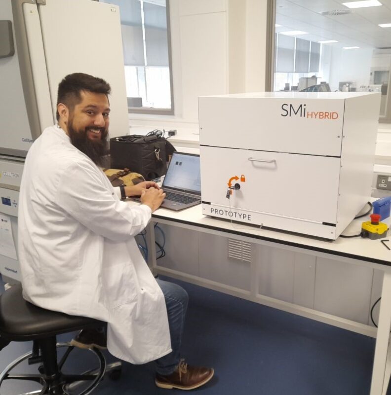 Michael J. Martinez working in the lab.