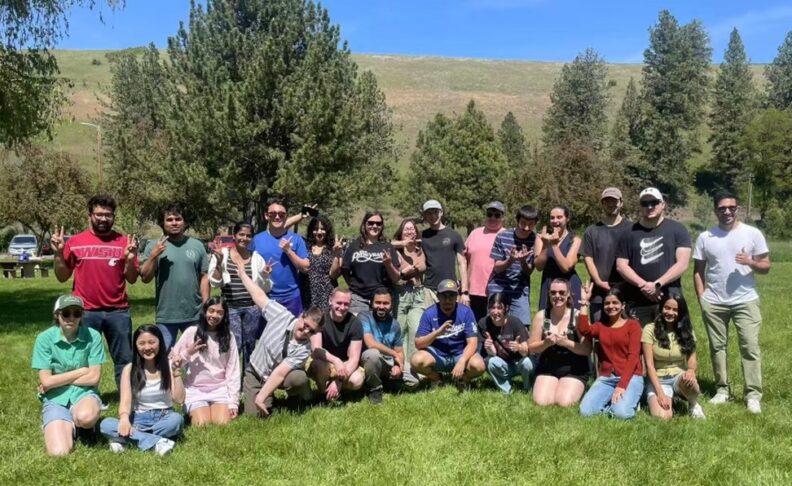 Graduate Chemistry Society members posing for picture outside.