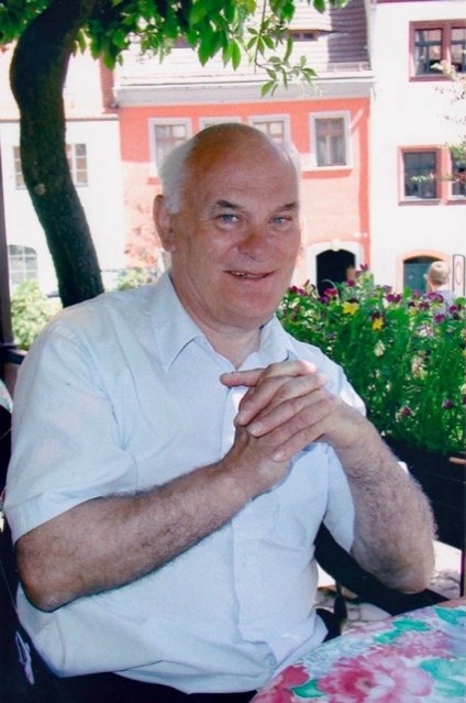 David Roundhill sitting at a table