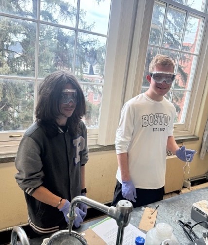 Students engaged in an experiment.