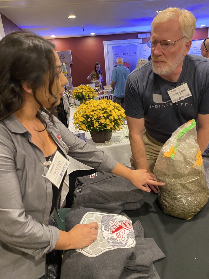 Jenifer Silva talking to WASBA Conference Attendee
