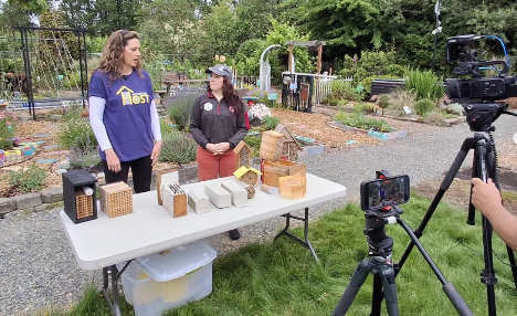 Thyra McKelvie (left) and Bri Price (right) at the WSU Puyallup Research and Extension Center Demonstration Garden.