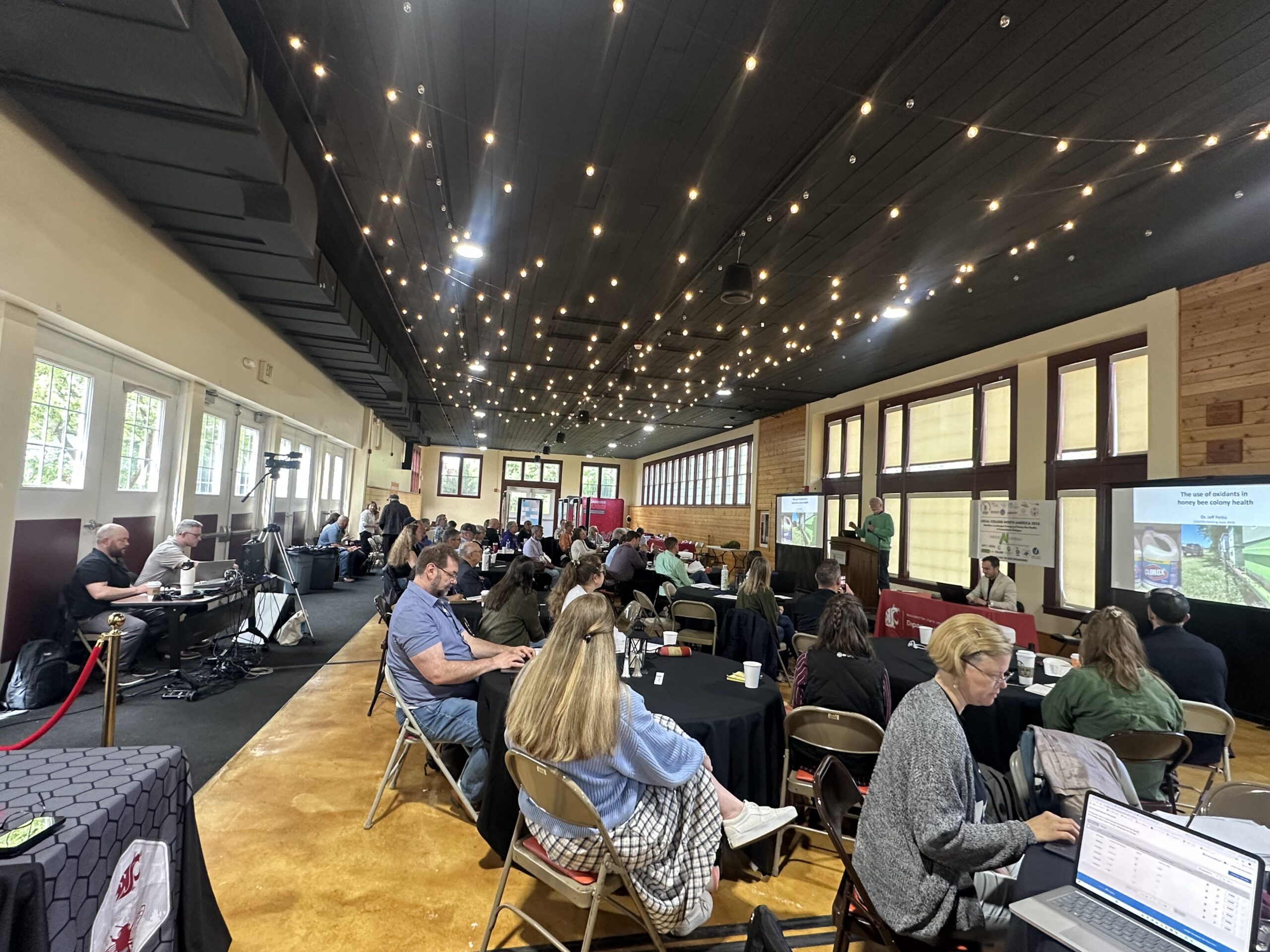 people sitting in chairs at the 2026 Local COLOSS North America Conference in Pullman, WA (June 6-9, 2026) in Ensminger Pavilion.