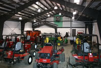 Turfgrass equipment in a storage building.