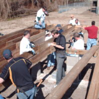 People building a house.