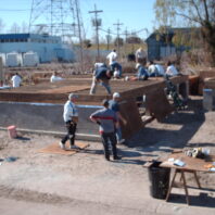 People building a house.