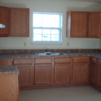 A kitchen with cabinets.