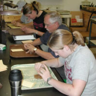 People working at desks.