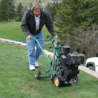 A person with a machine.