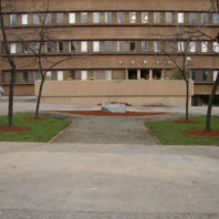 Courtyard with a building.