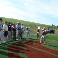 People listening to a presenter.