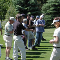 People looking at plots.