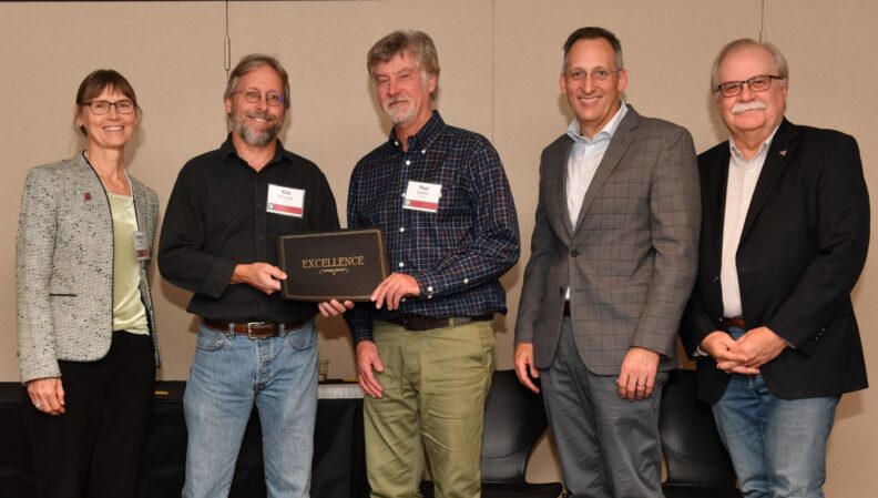 Interim Provost Bryan Slinker and ATL Director Kimberly Green presenting a certificate to Chemistry.