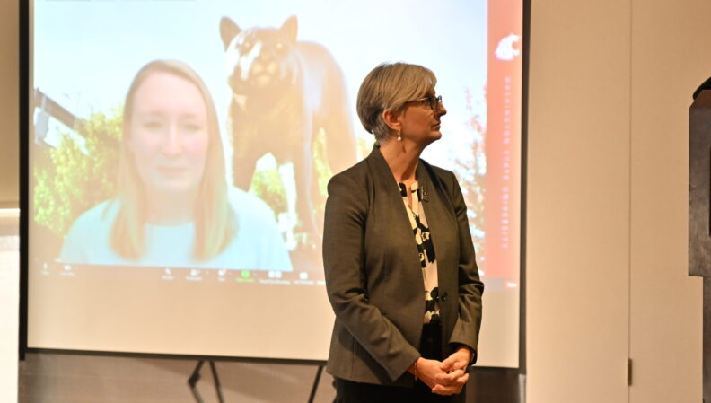 Provost Elizabeth Chilton presenting a certificate to the Nursing, BS.