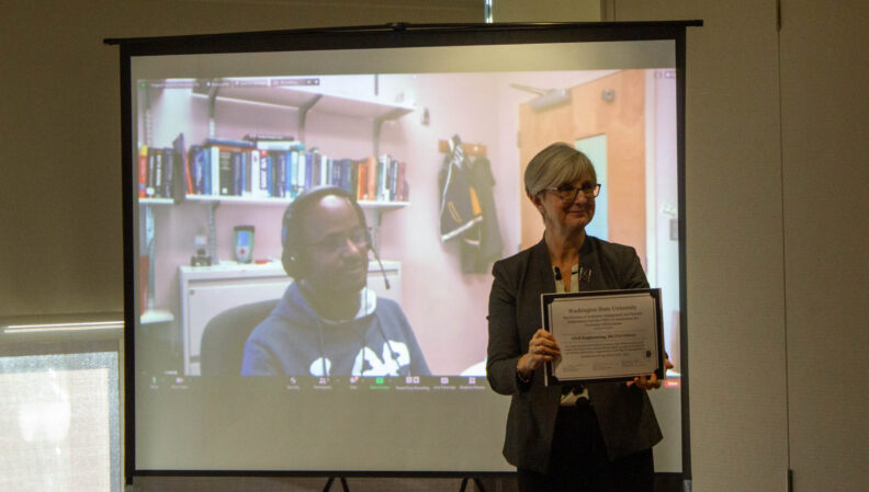 Provost Elizabeth Chilton presenting a certificate to the Civil Engineering, BS (Tri-Cities).