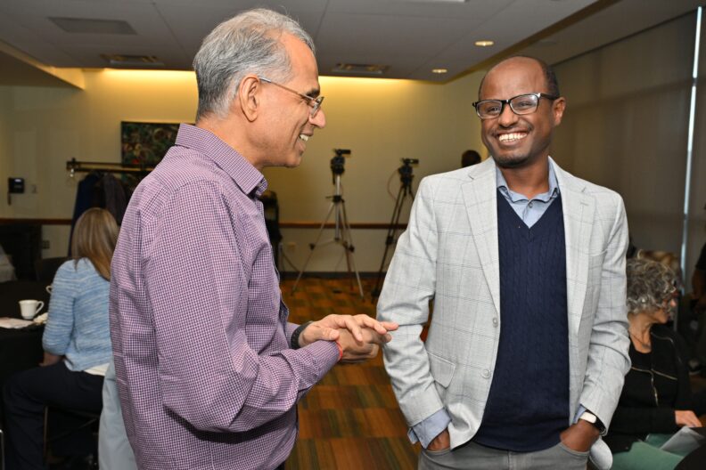 Attendees talking at 2024 Celebration of Assessment Excellence