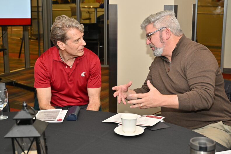 Attendees talking at 2024 Celebration of Assessment Excellence